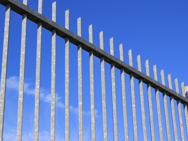 Galvanised metal vertical bar fencing