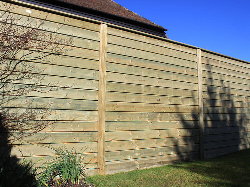 Timber cladding fence