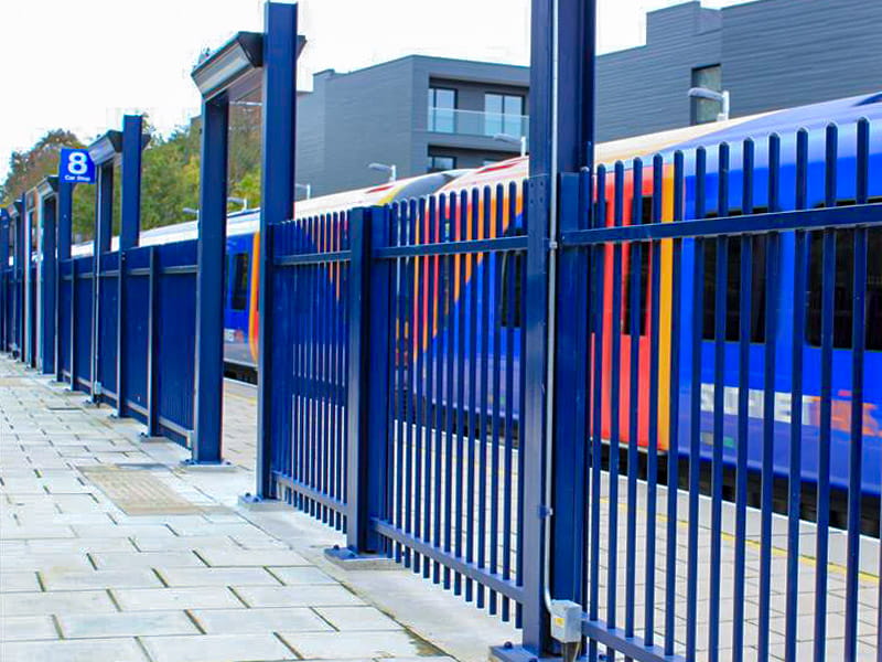 vertical bar train station fencing