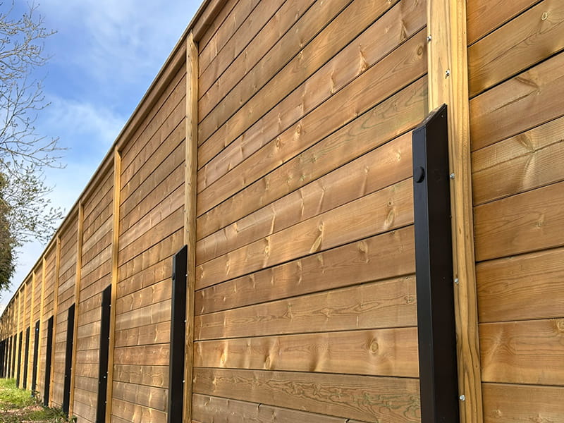 Padel court noise reduction barriers