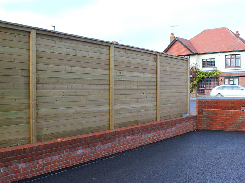 Acoustic barrier for car showroom