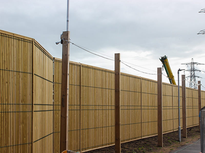 Timber and mesh fence panels