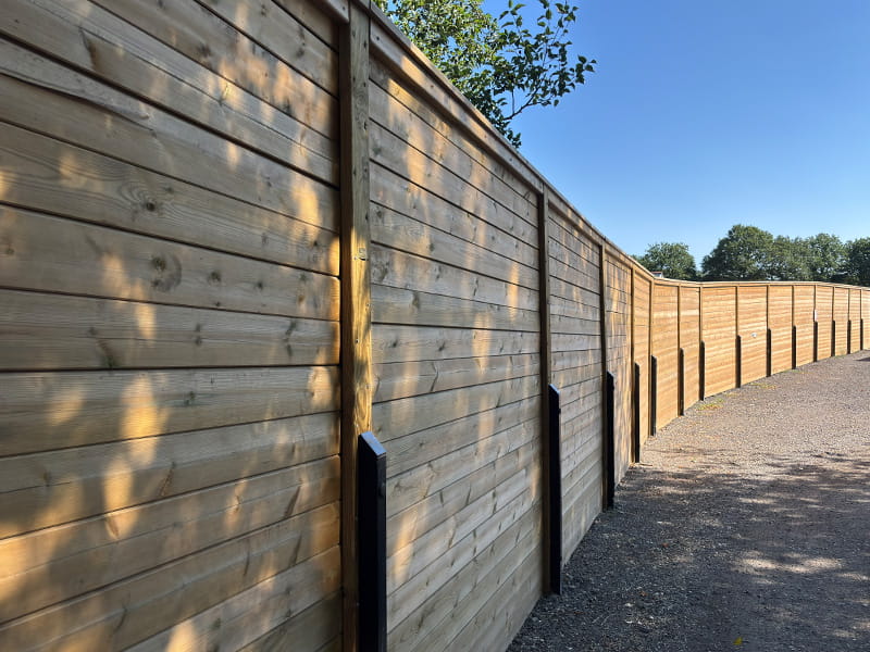 Acoustic barrier for dog kennels