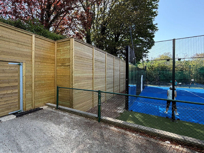 Acoustic fence panels for padel court