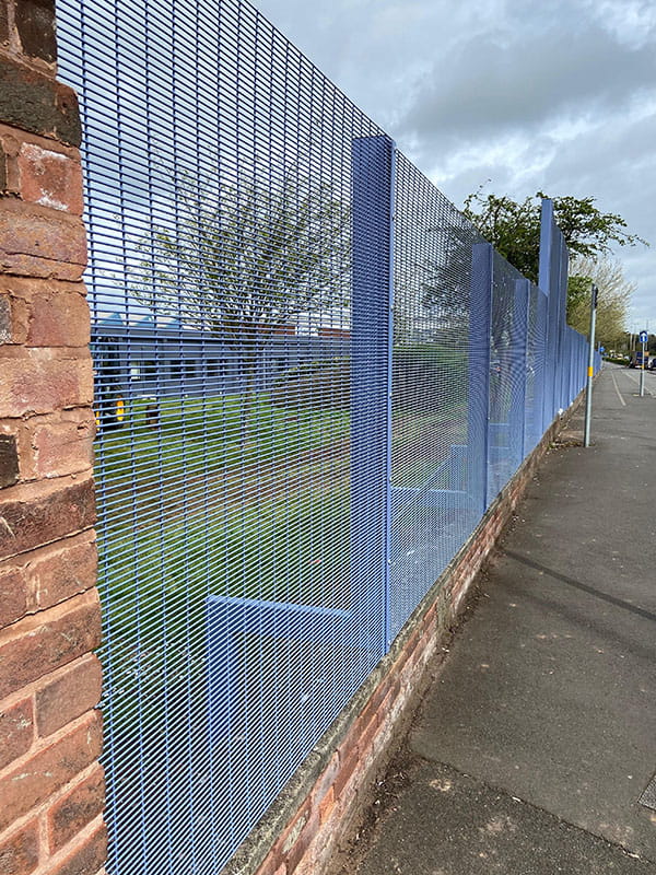 Blue mesh security fencing