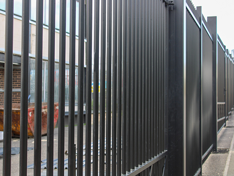 black galvanised steel gate and railings for storage unit