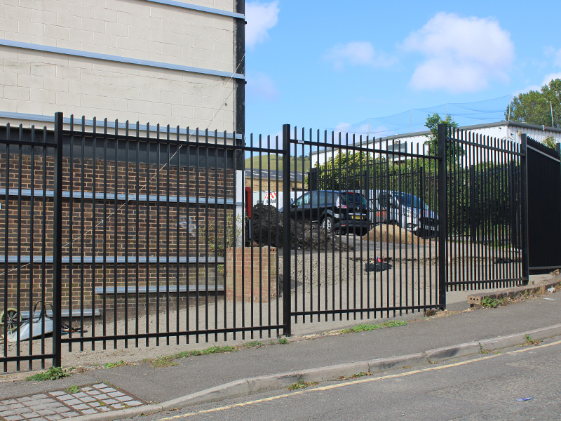 black galvanised steel railings around a bend