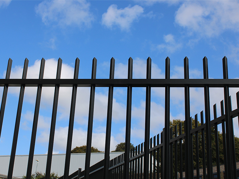 black steel railings and swing gate