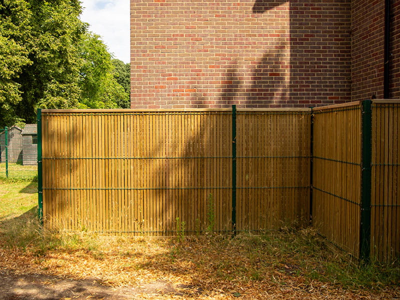 Mesh and timber fencing