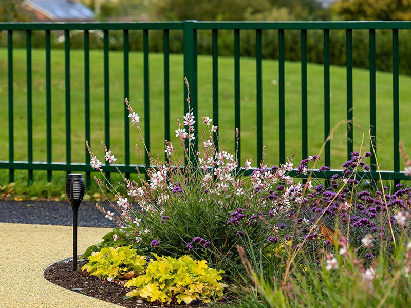 Green playground fencing