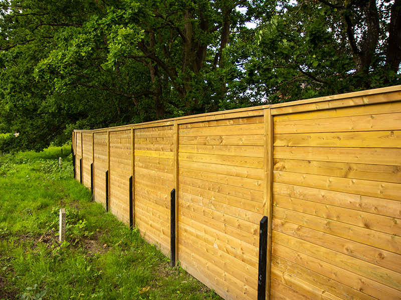 Housing development acoustic barrier