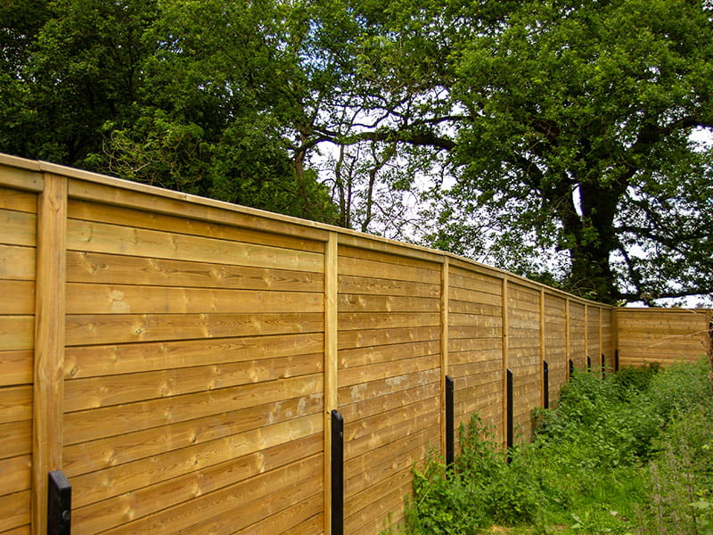 Housing development acoustic fence