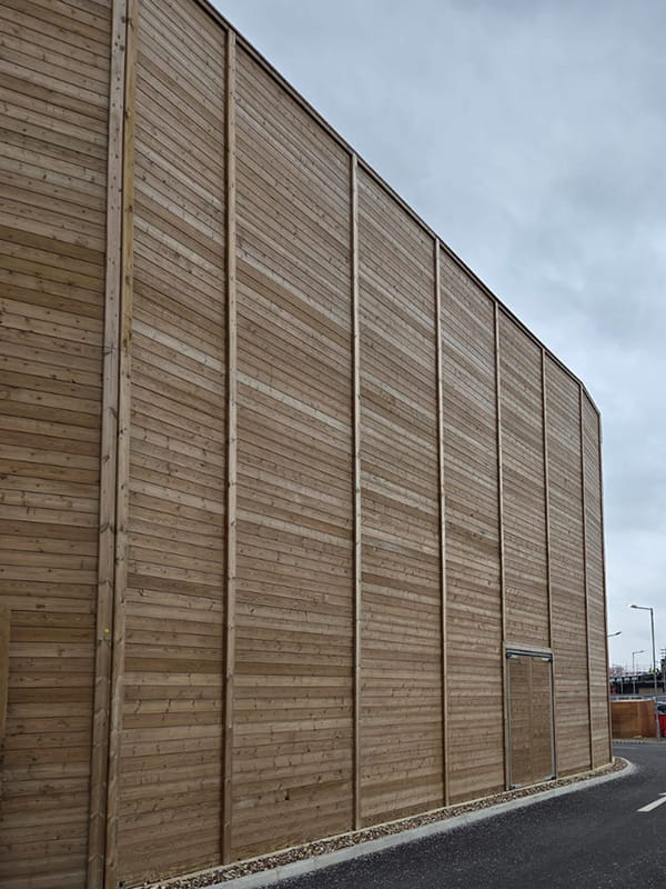 Tall timber acoustic barrier