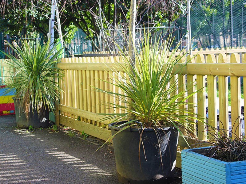 Wooden playground fencing