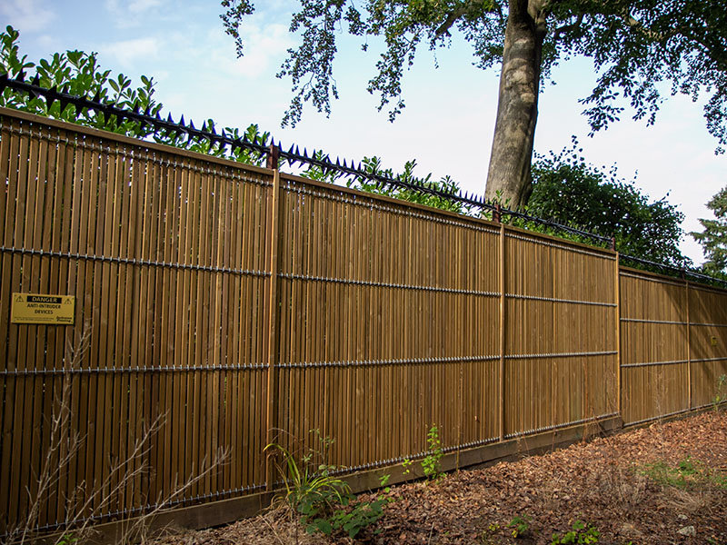 Security fencing with topping