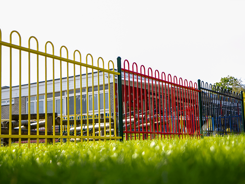 metal multi coloured playground fencing