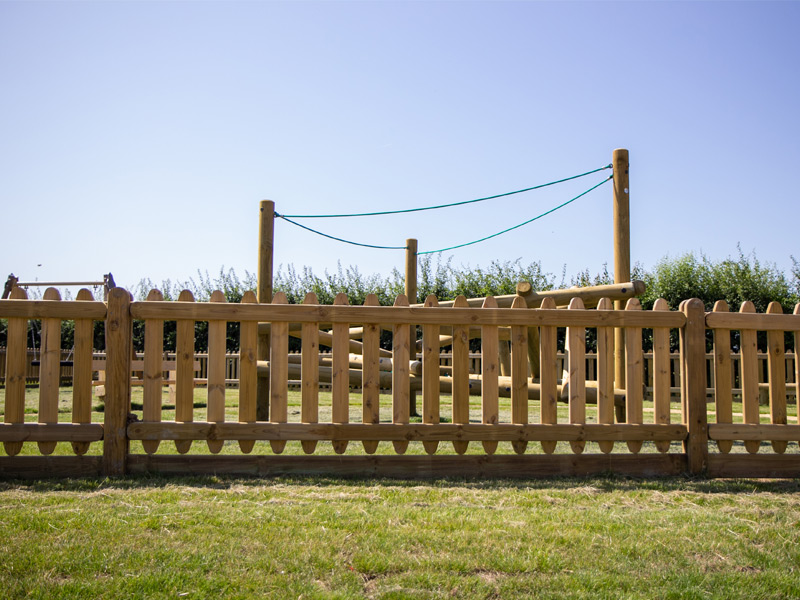 Timber playground fence