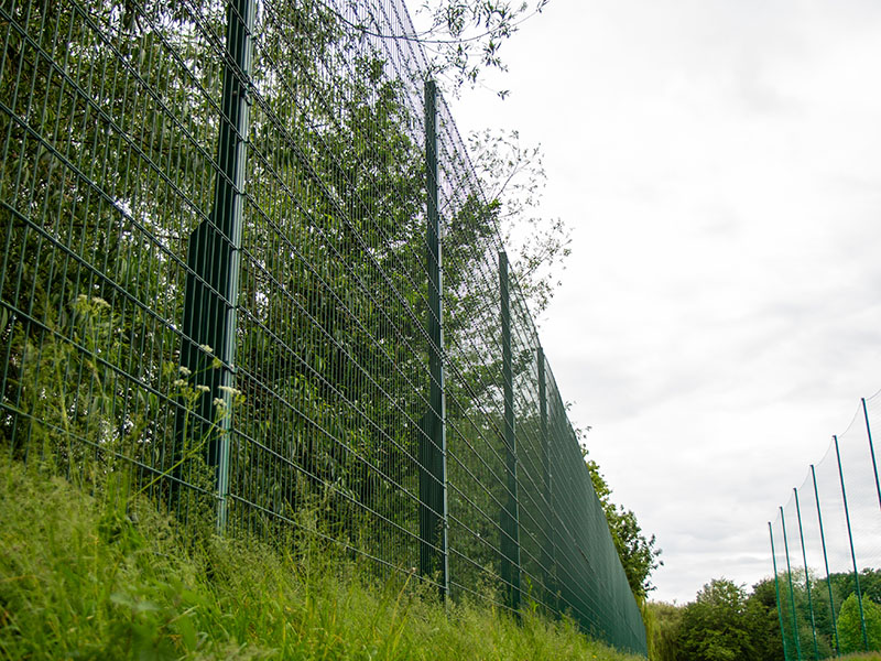Green mesh fencing