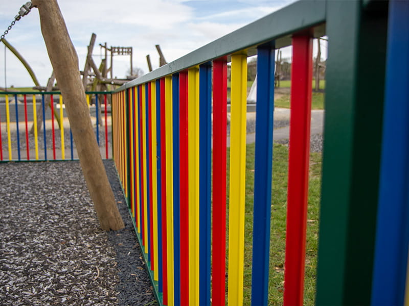 Colourful playground fencing