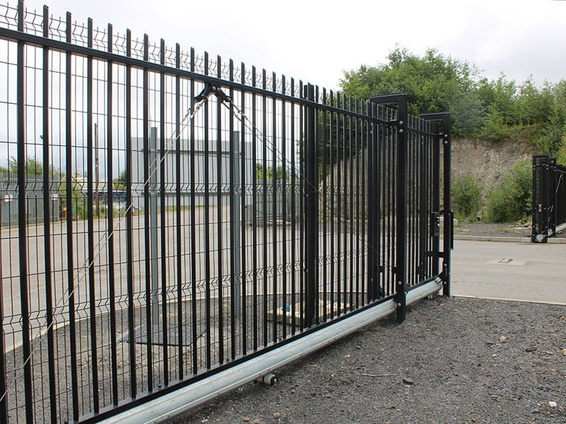 Black Barbican® sliding gate for vehicle access