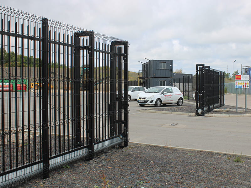 Black double leaf Barbican® sliding gate for vehicle access