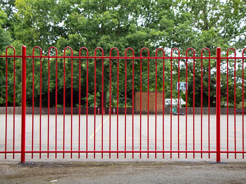 Red metal fencing
