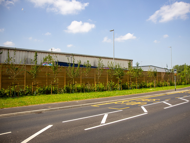 Highway noise barrier