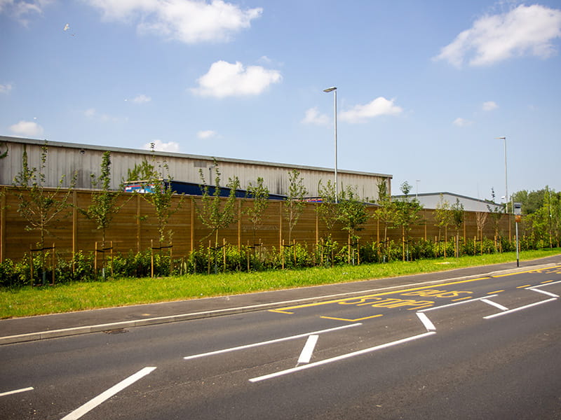 Highway noise barrier
