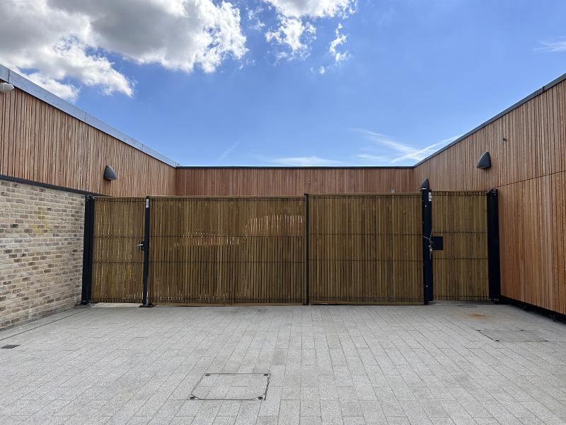 Timber clad mesh fencing