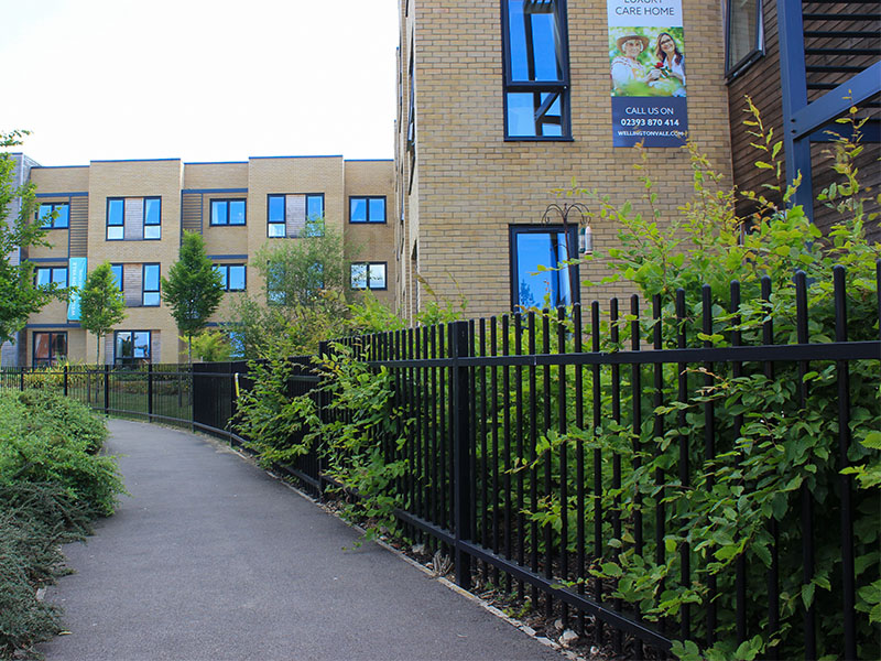 Black vertical bar fencing for retirement homes