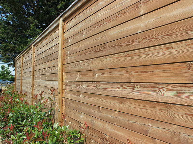 Acoustic barrier fence posts