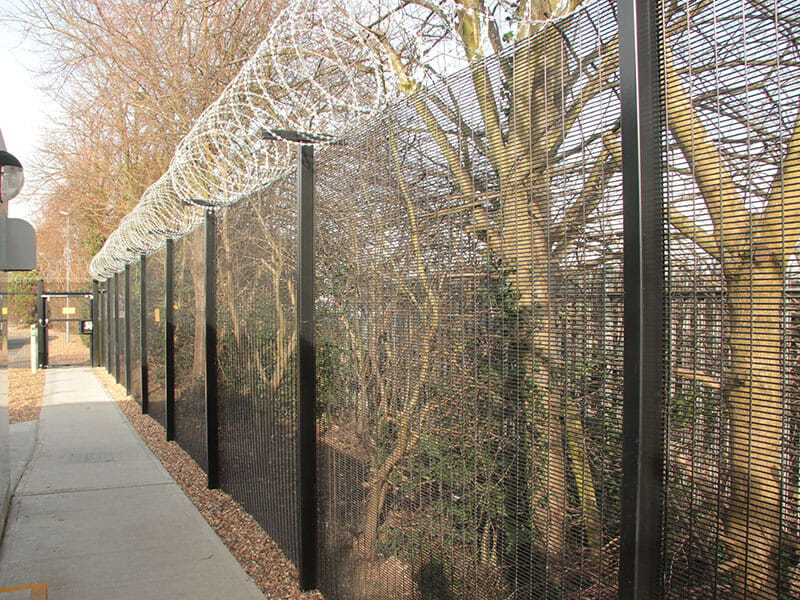Metal fence posts for barbed wire
