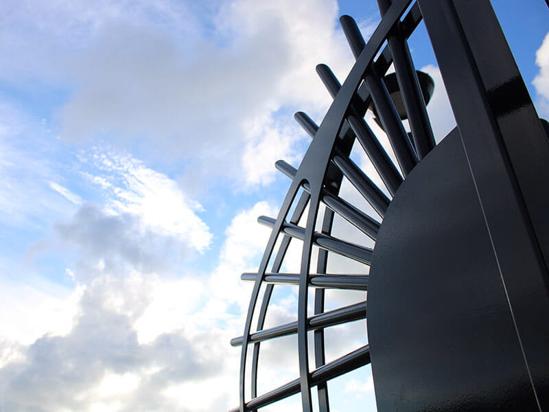 Security fencing fan panels protecting pier and marina