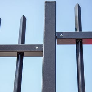 Vertical bar fence post