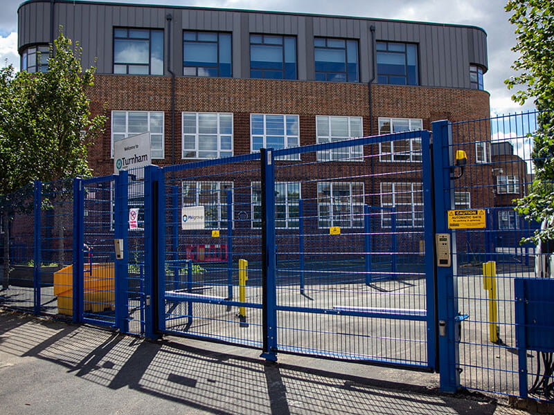 Blue mesh double leaf gate