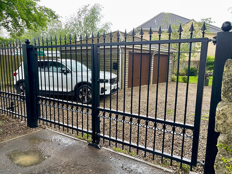 Black metal driveway gates