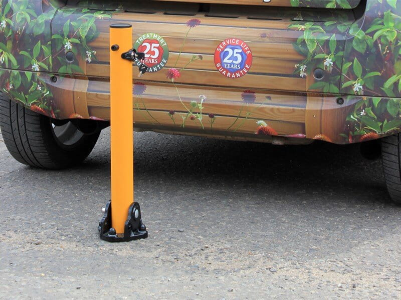 Collapsible steel parking post