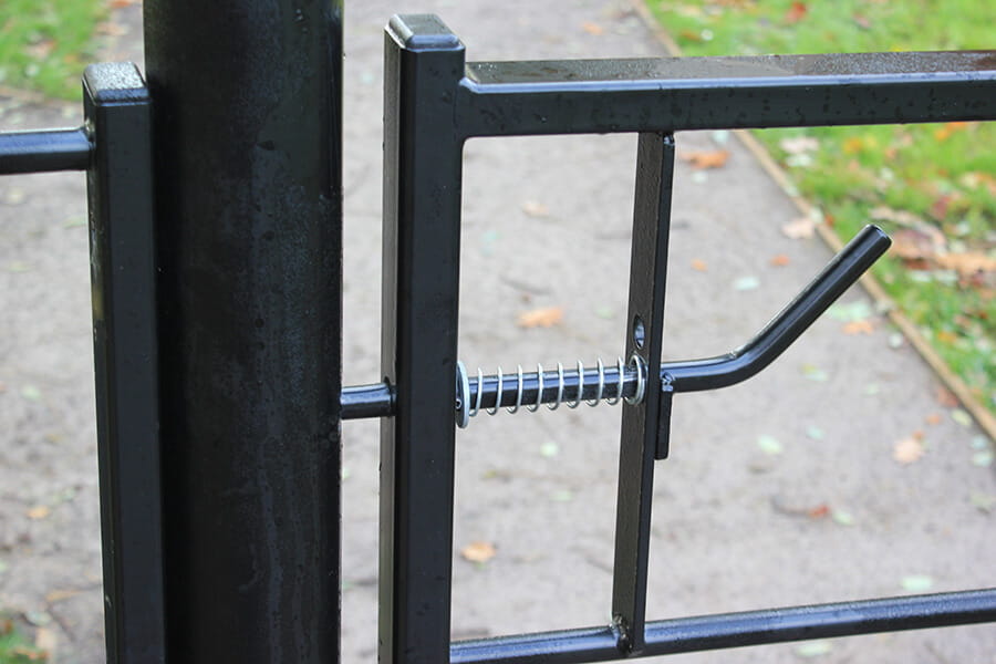 Estate railing gate with plastic caps