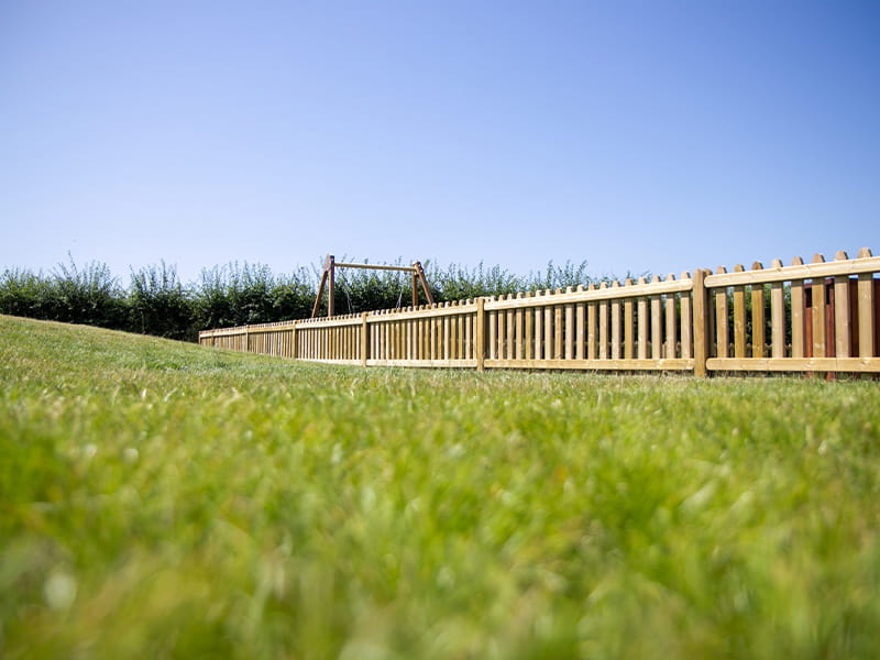 Timber playground fence