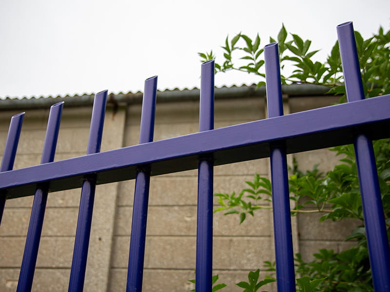 Dark blue steel security fencing