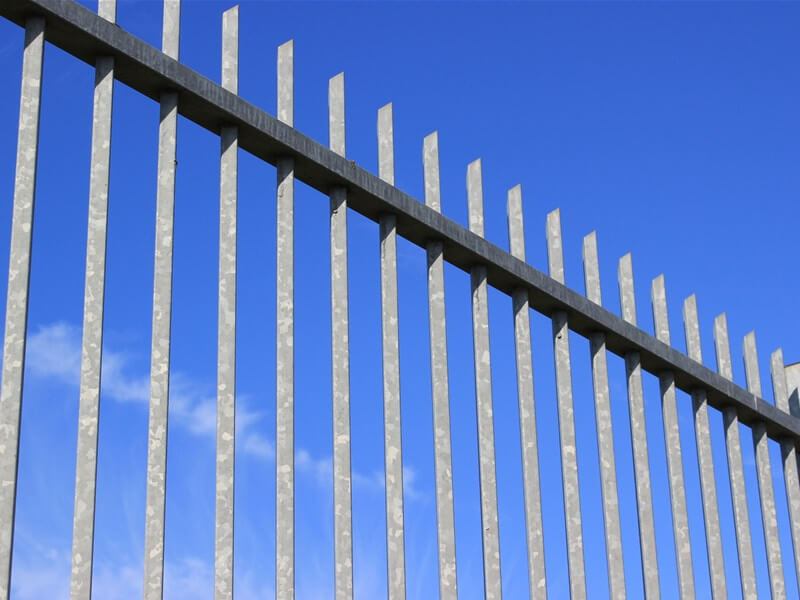 Galvanised metal vertical bar fencing