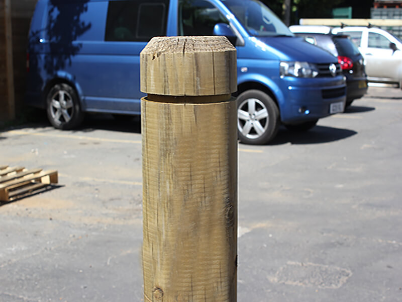 Machine rounded and grooved bollard